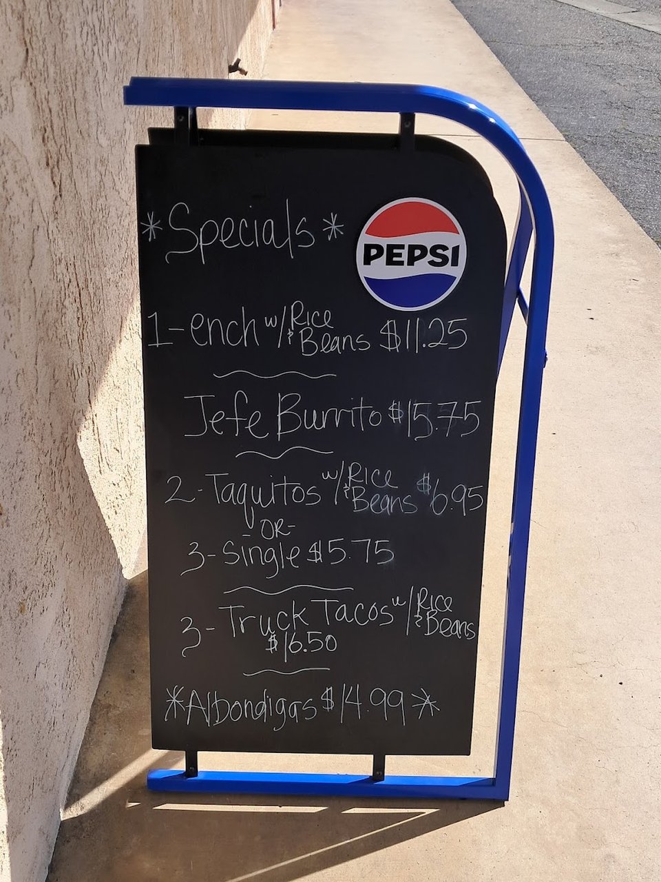Printed menu with Mexican dinners and specialties.
